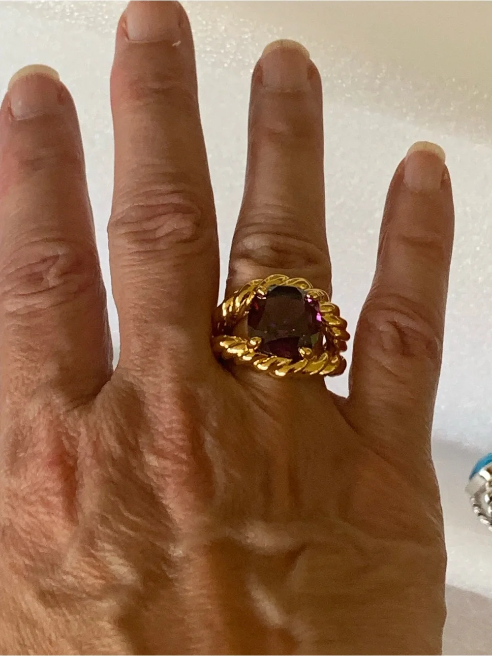 Gold-Tone Rope Ring with Deep Purple Cushion Gem